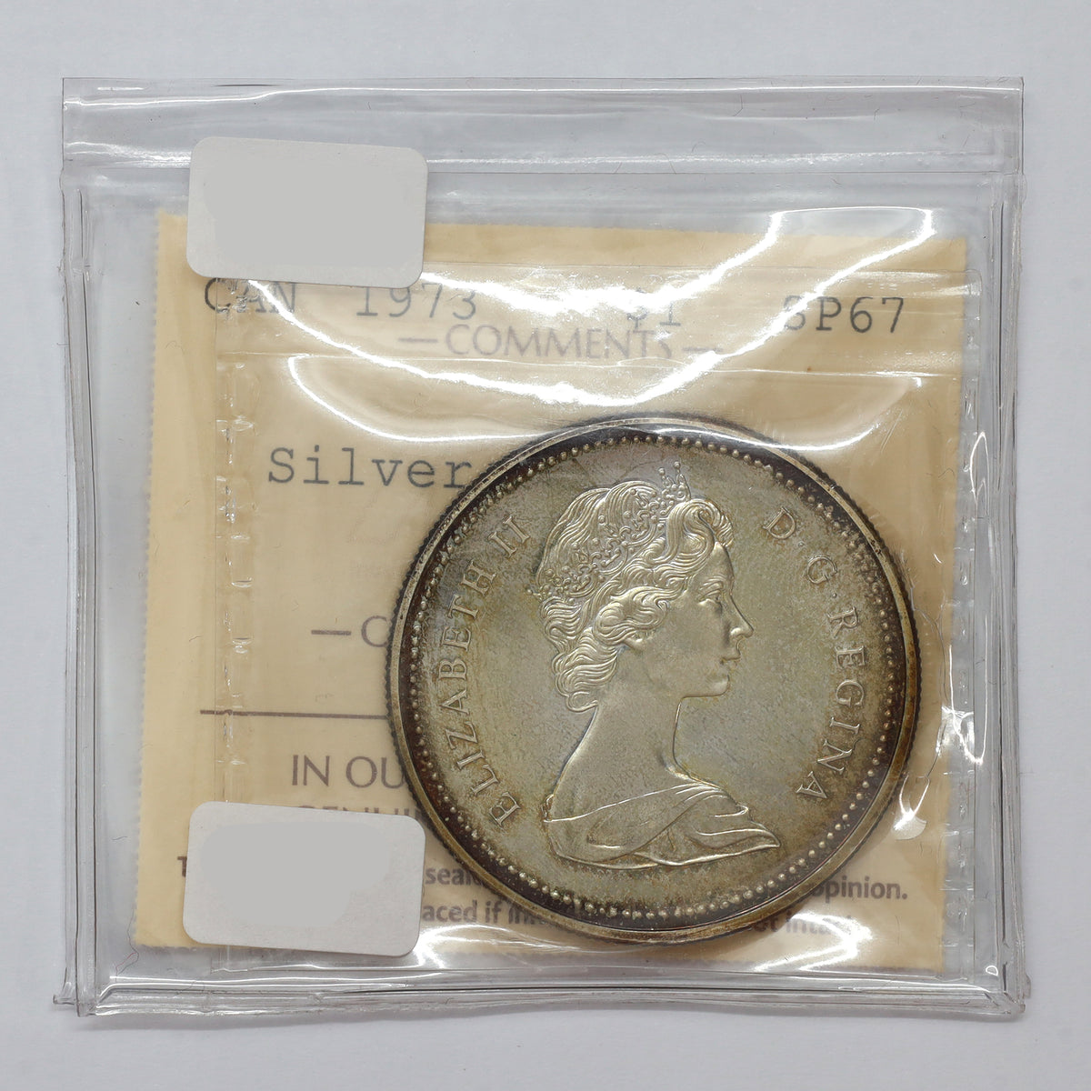 1973 Canada RCMP Silver Dollar ICCS Certified SP67 (toned)