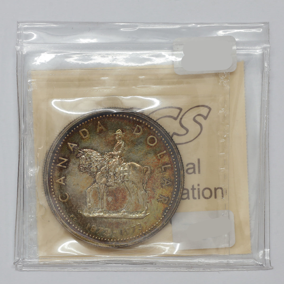1973 Canada RCMP Silver Dollar ICCS Certified SP67 (toned)